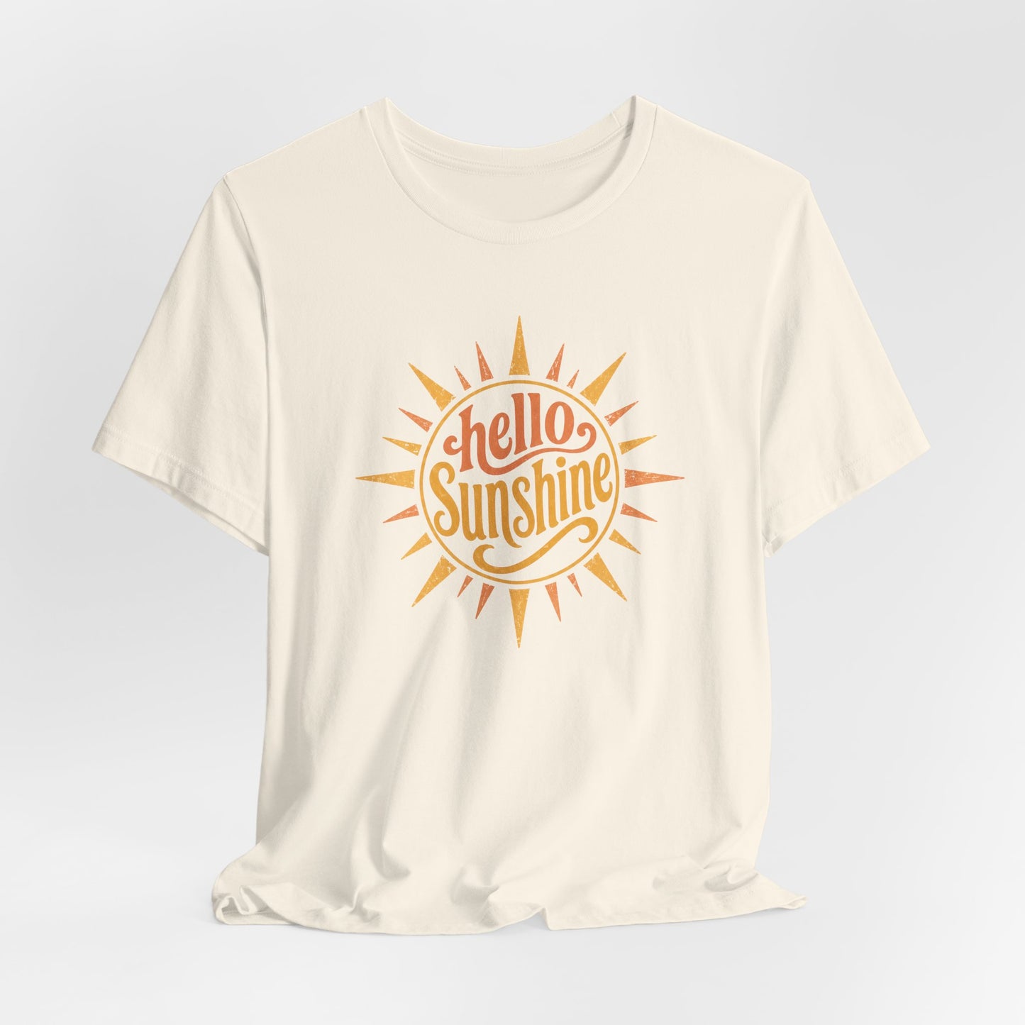 White t-shirt with 'Hello Sunshine' graphic design on a light gray background