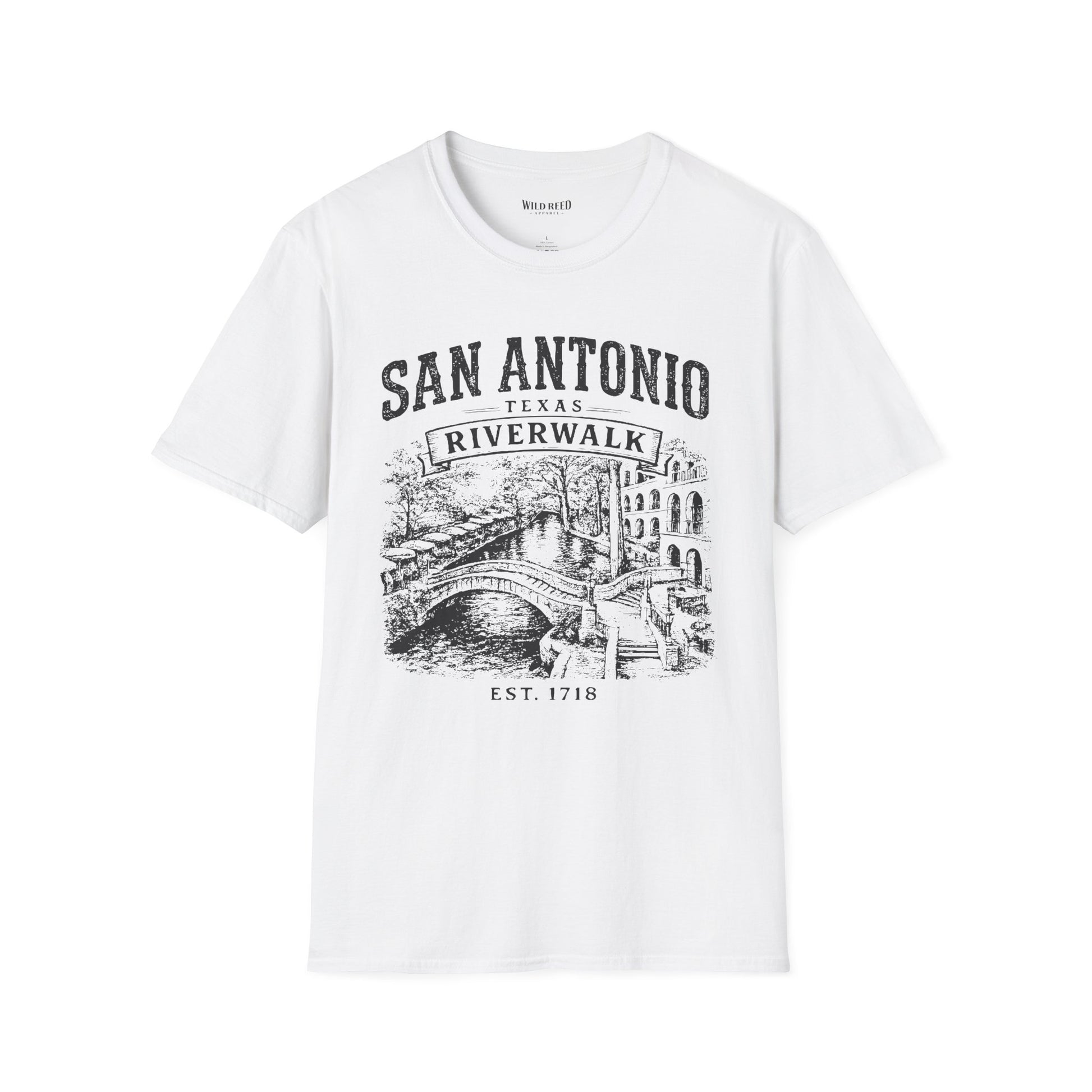 A white short-sleeve crewneck t-shirt featuring a black graphic print of San Antonio's Riverwalk with a bridge and the text 'SAN ANTONIO TEXAS RIVERWALK EST. 1718'.