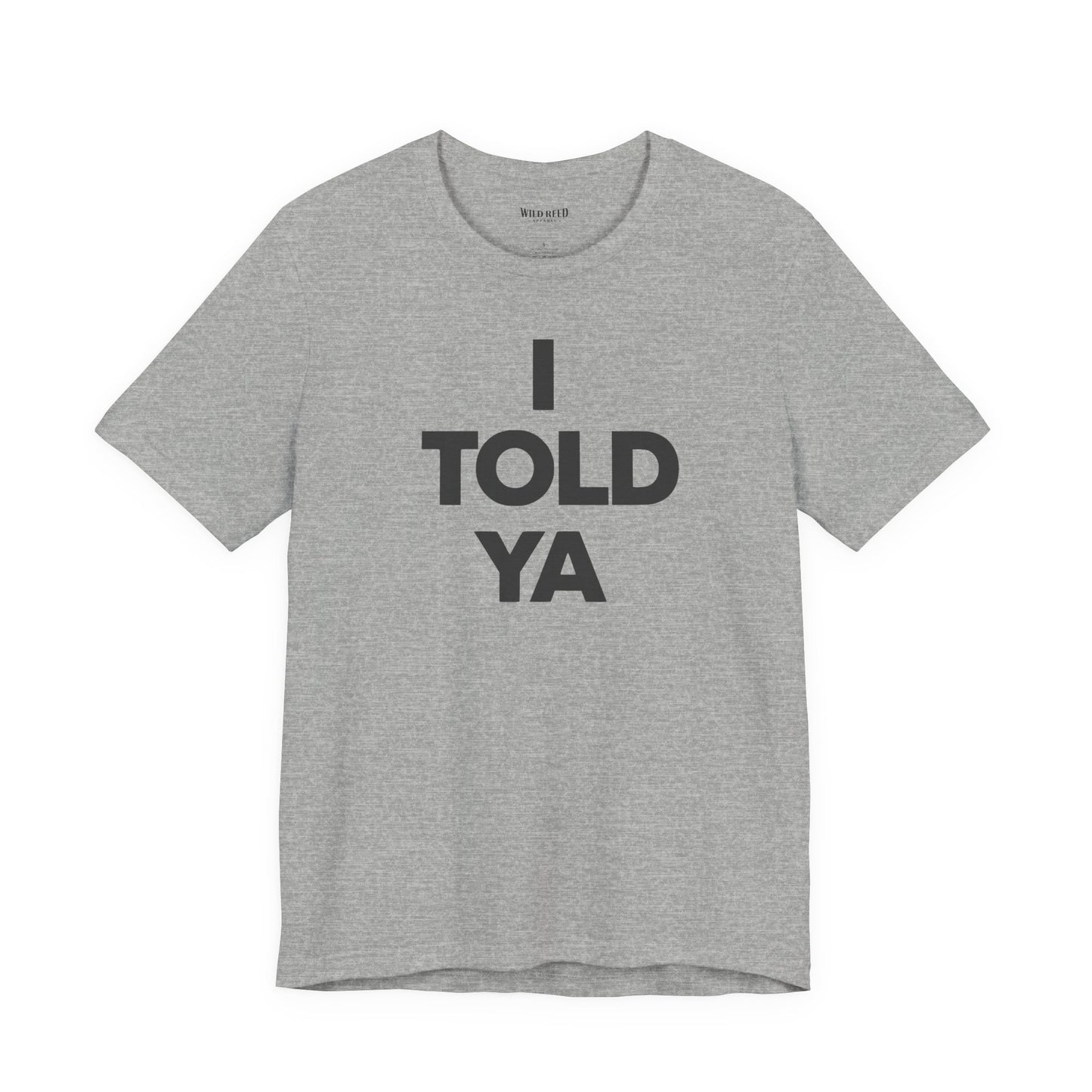 Athletic Heather Bella+Canvas 3001 featuring a bold I Told Ya minimalist typography design by Wild Reed Apparel.