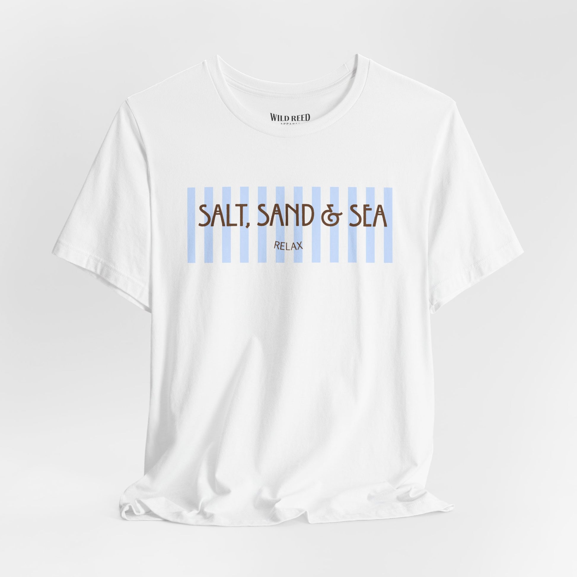 A white short-sleeve crewneck t-shirt with a graphic on the chest featuring light blue vertical stripes and brown text reading 'SALT, SAND & SEA' with 'RELAX' underneath. The brand 'WILD AID' is printed inside the collar.