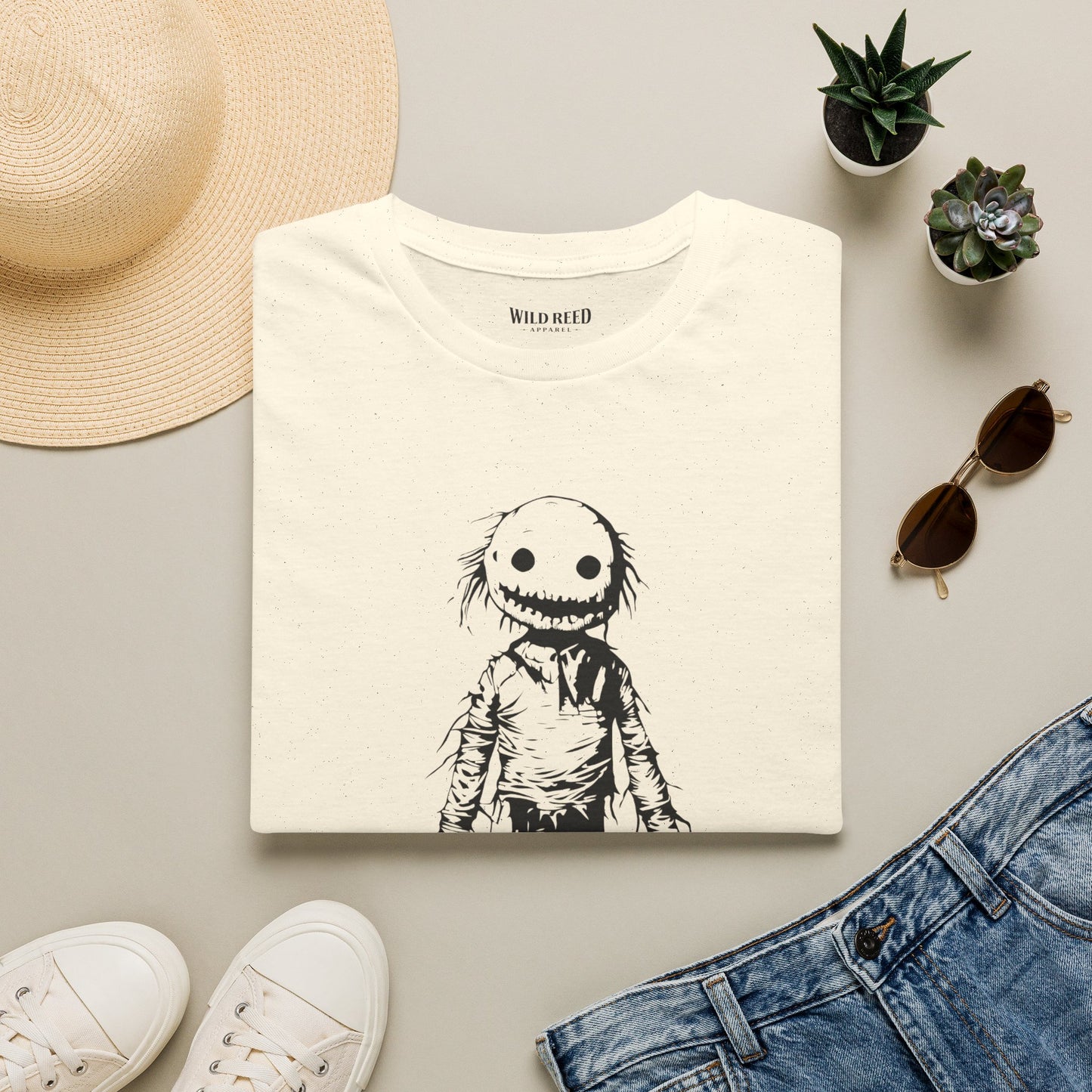 Wild Reed Apparel Creepy Smiley Monster Halloween Shirt | Vintage Horror Graphic Tee