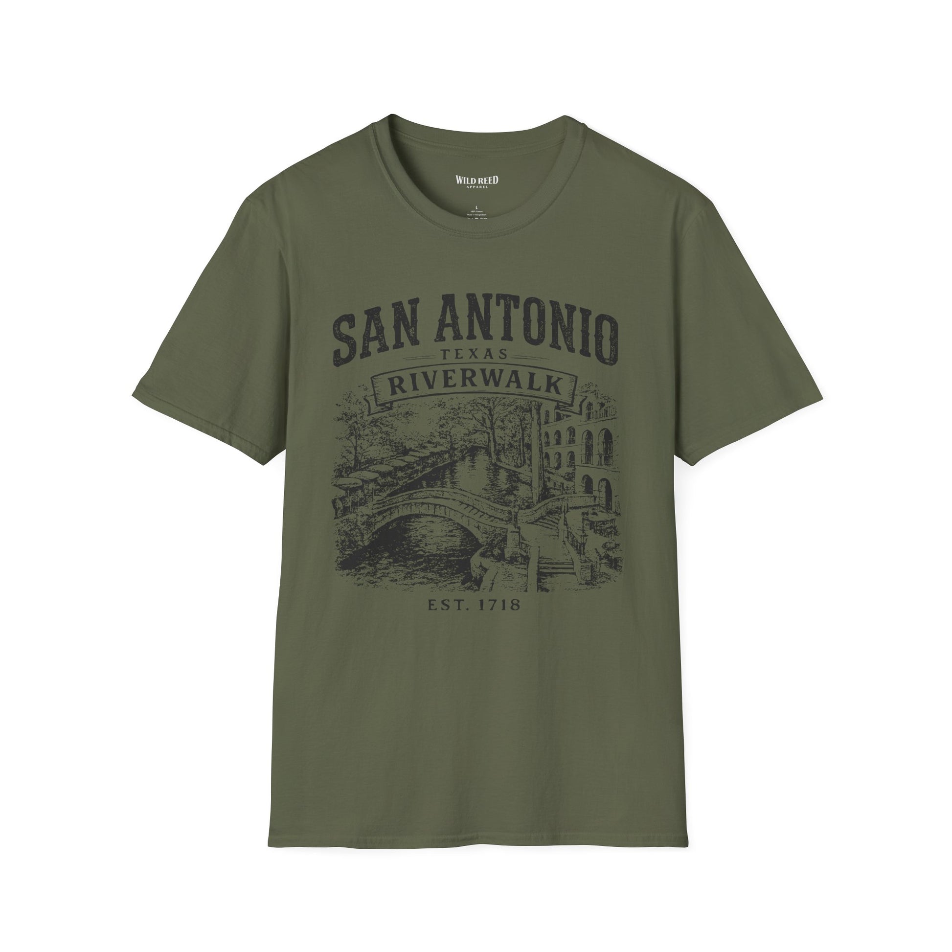 A military green short-sleeve t-shirt with a dark gray graphic print on the front reading 'SAN ANTONIO RIVERWALK TEXAS EST. 1718' above an illustration of a river scene with a bridge.