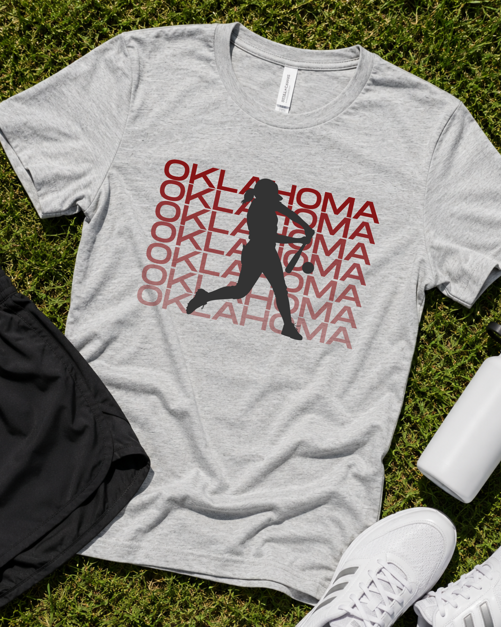 Athletic heather Oklahoma softball graphic tee flat lay with sporty game day styling