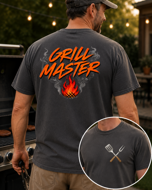 Grill Master BBQ graphic tee with distressed orange lettering, smoke details, and flame artwork for backyard grilling and barbecue lovers
