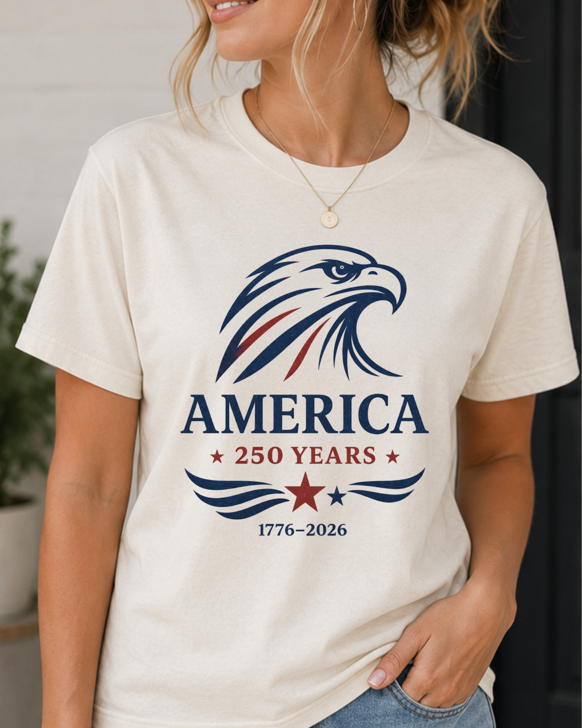 Woman wearing a vintage America 250 eagle graphic printed on a patriotic unisex t-shirt featuring a 1776-2026 commemorative design.