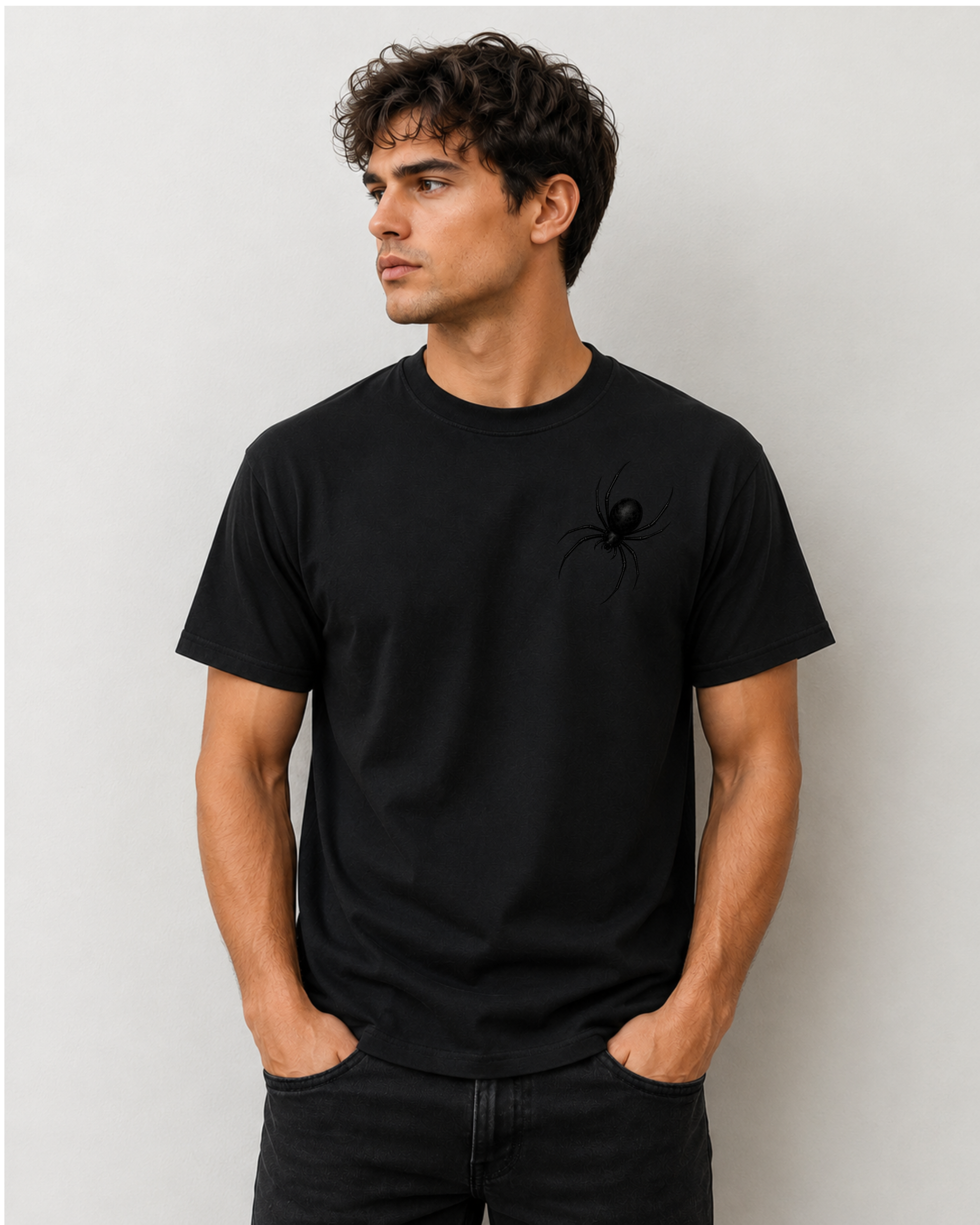 A black stealth spider design on a black short-sleeve t-shirt 