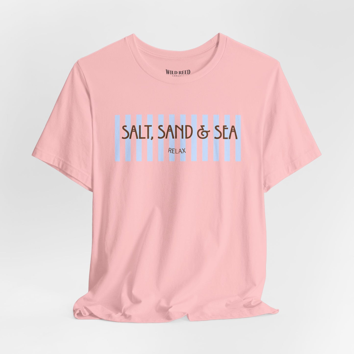 Pink Salt, Sand & Sea beach graphic tee featuring light blue stripes and brown vintage-inspired lettering.