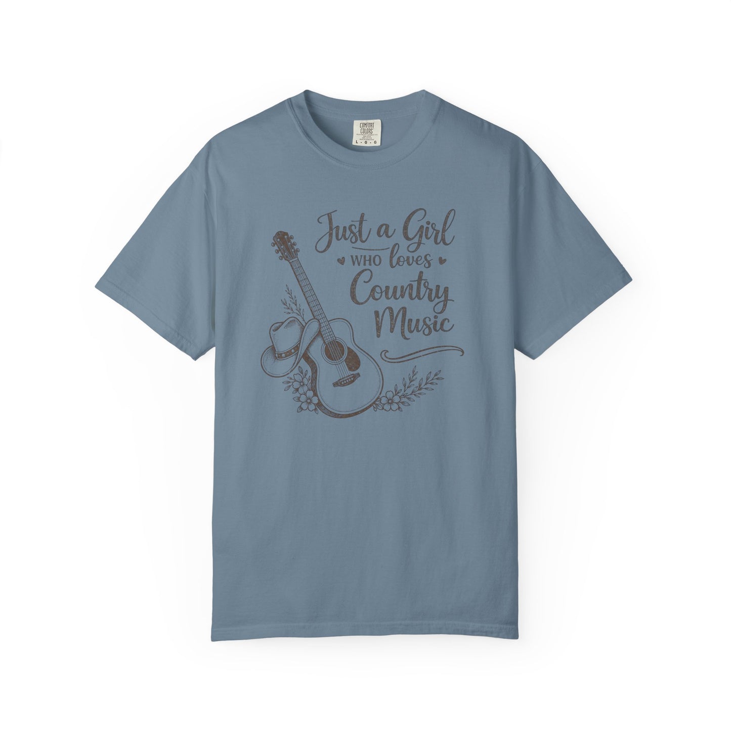 Blue t-shirt with a graphic of a guitar and text 'Just a Girl Who Loves Country Music' on a white background