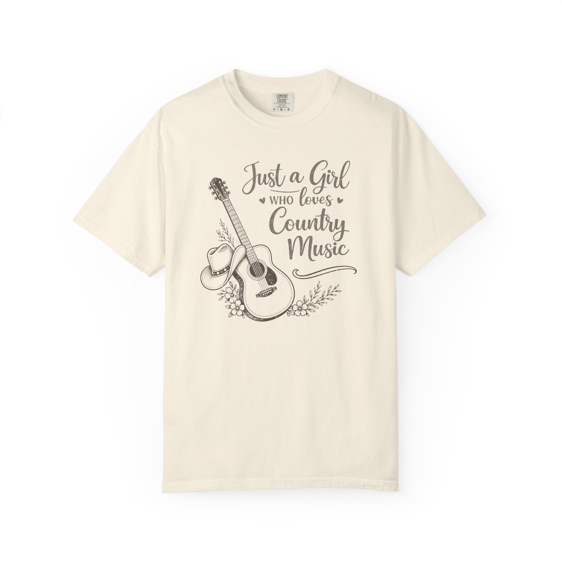 Ivory t-shirt with a graphic of a guitar and text 'Just a Girl Who Loves Country Music' on a white background